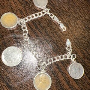 Elegant Silver and Gold Coin Charm Bracelet